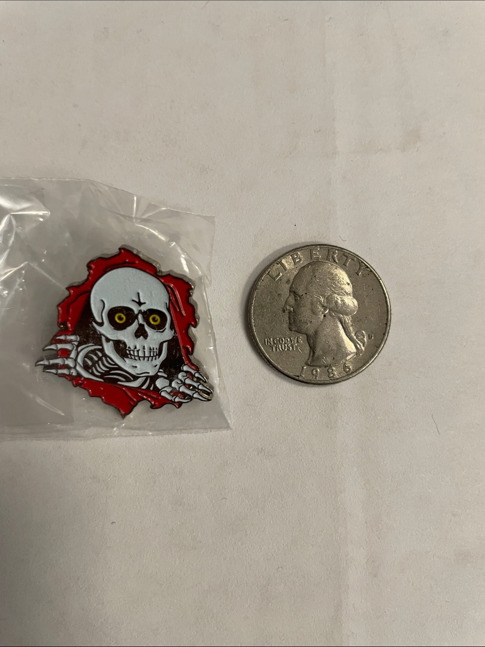 Powell Peralta ripper Skull Pin with Red Tear-Away Background